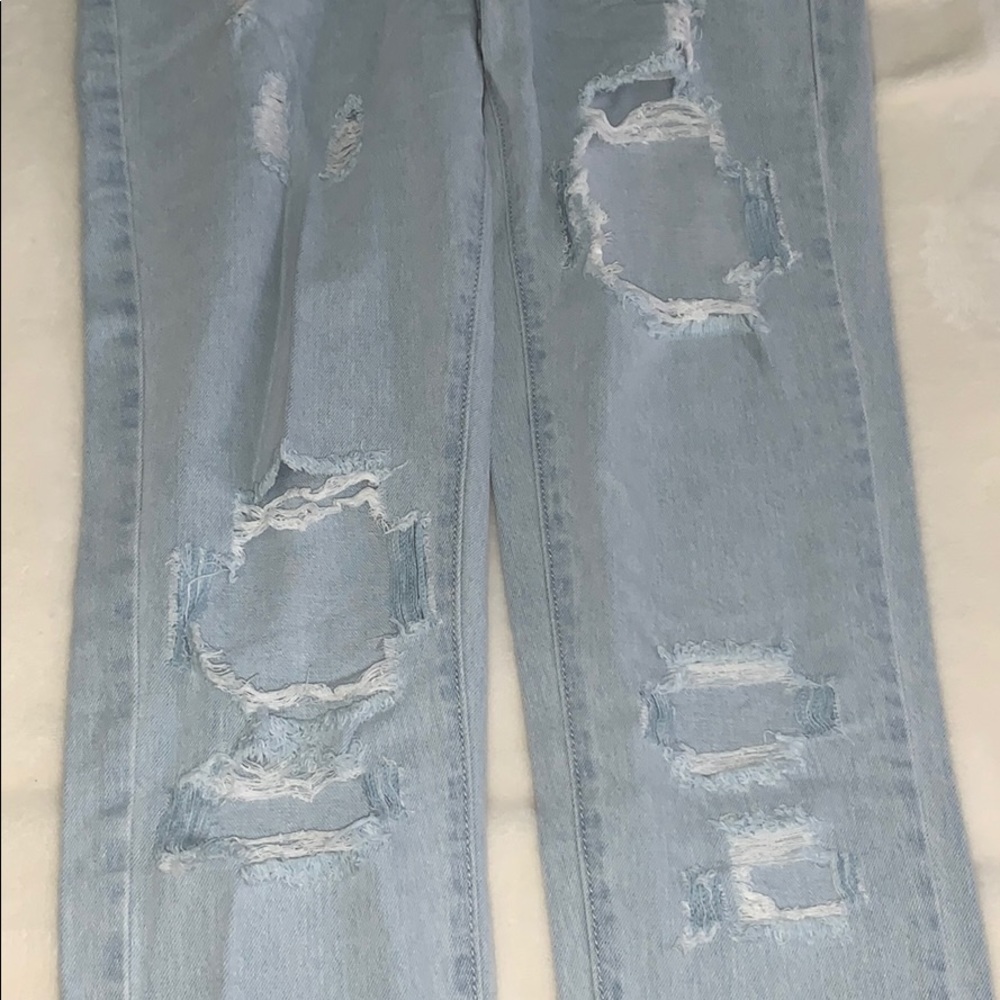 Light wash distressed boyfriend jeans